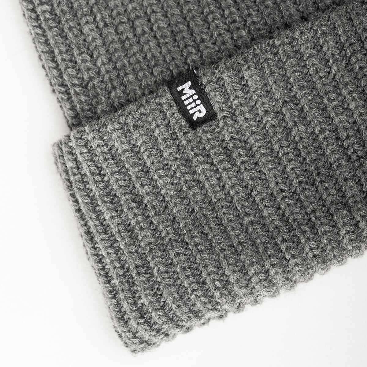 jodie-williams-beanie-u6 WebPDP-RecycledPolyRibBeanie_Studio_TagDetail_GrayHeather__BNE002400OS.jpg